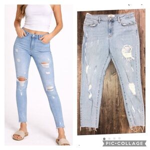 Distressed bleach splattered raw hem jeans